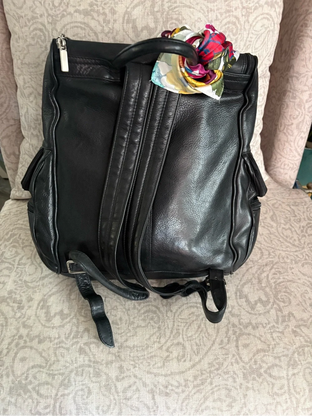 Wilsons Leather Black Leather Backpack with Colorful Floral Scarf